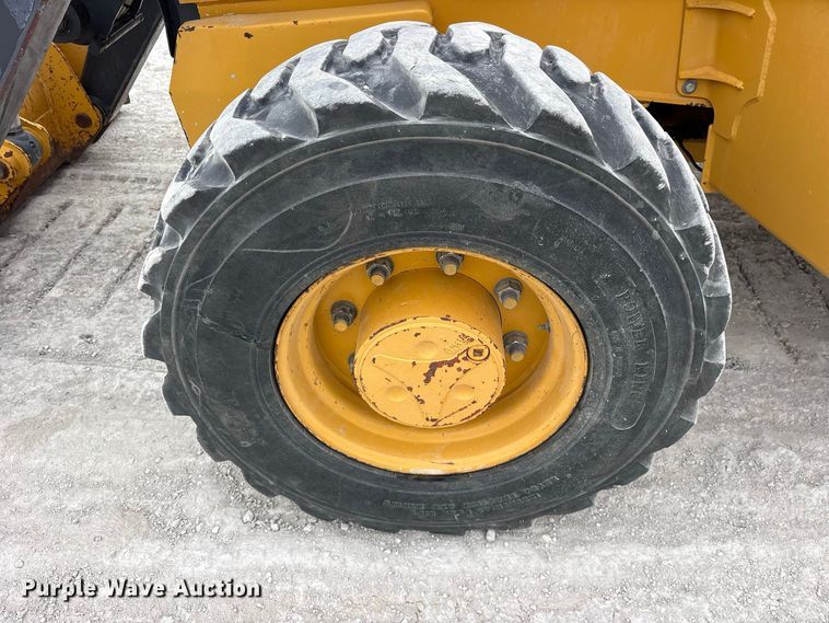 image for item ES8286 2015 John Deere 310K backhoe