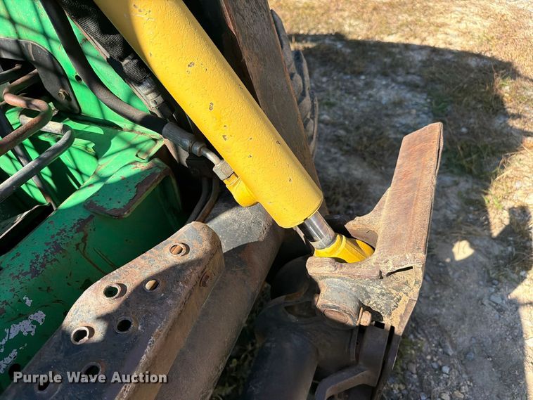 image for item FC3463 1999 John Deere 240 skid steer loader