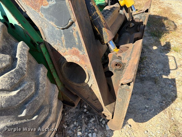 image for item FC3463 1999 John Deere 240 skid steer loader