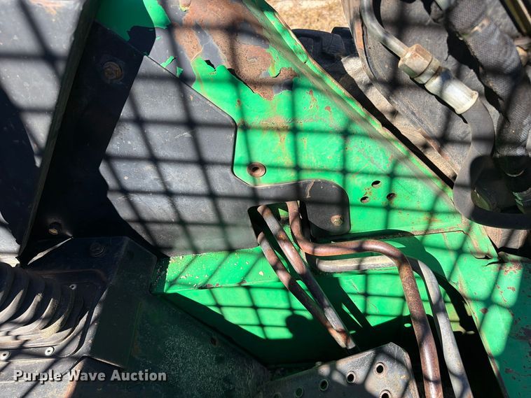 image for item FC3463 1999 John Deere 240 skid steer loader