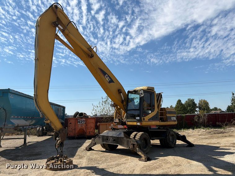 image for item FK3834 1999 Caterpillar M320 wheeled excavator