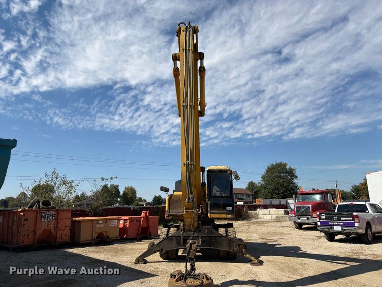 image for item FK3834 1999 Caterpillar M320 wheeled excavator