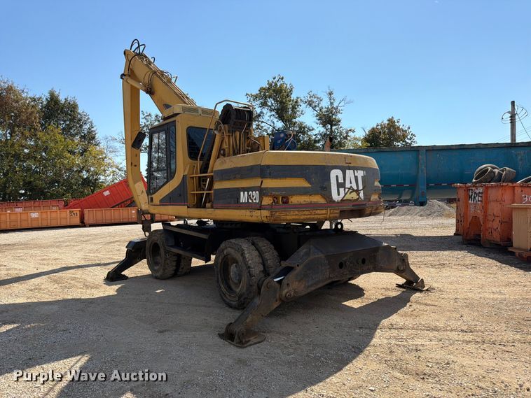 image for item FK3834 1999 Caterpillar M320 wheeled excavator