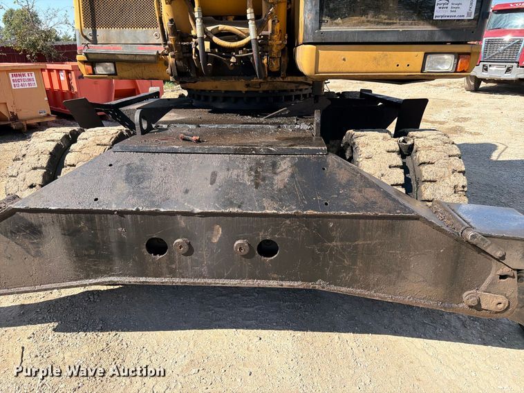 image for item FK3834 1999 Caterpillar M320 wheeled excavator