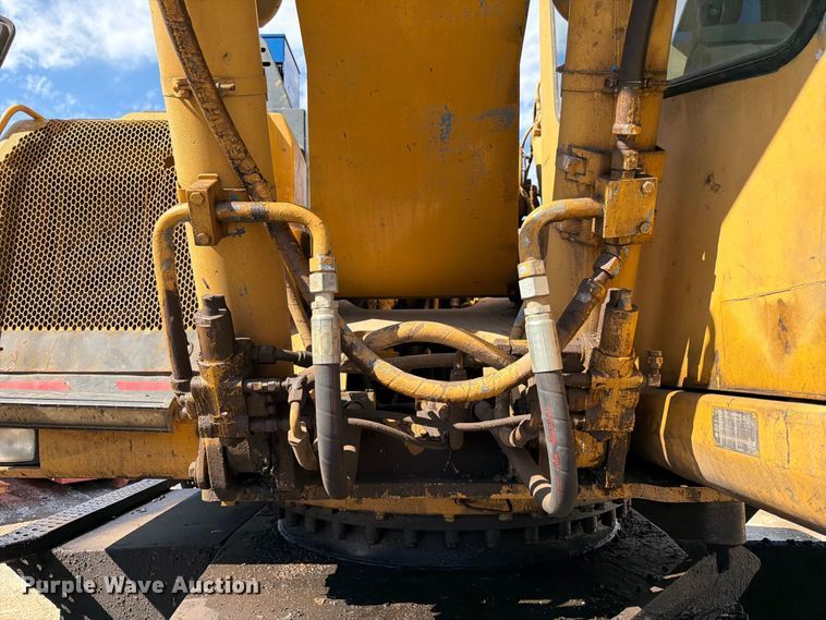 image for item FK3834 1999 Caterpillar M320 wheeled excavator