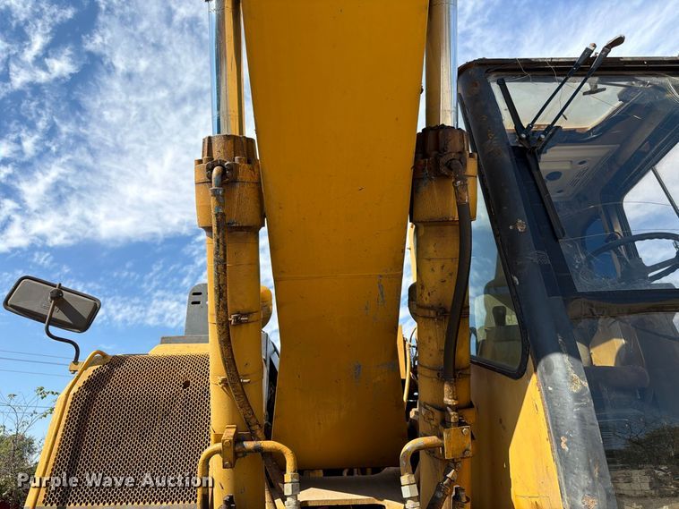image for item FK3834 1999 Caterpillar M320 wheeled excavator