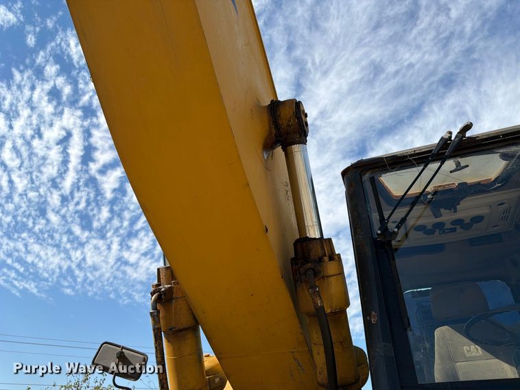 image for item FK3834 1999 Caterpillar M320 wheeled excavator