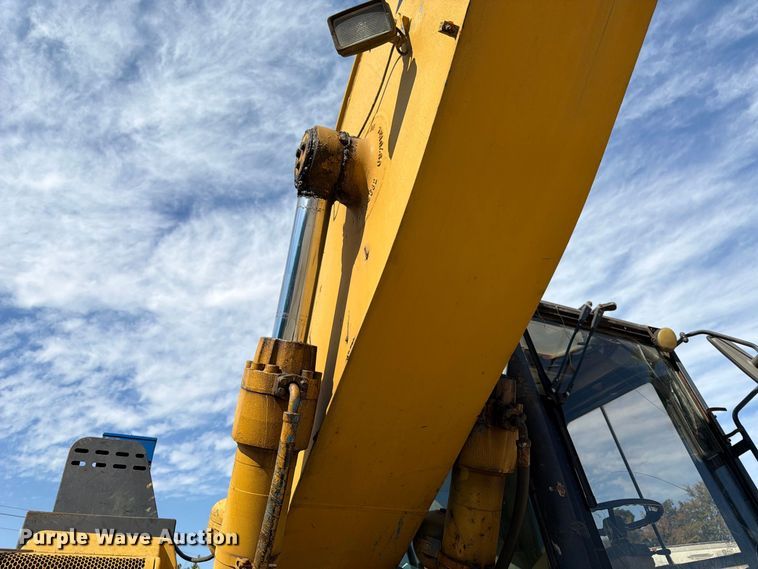 image for item FK3834 1999 Caterpillar M320 wheeled excavator