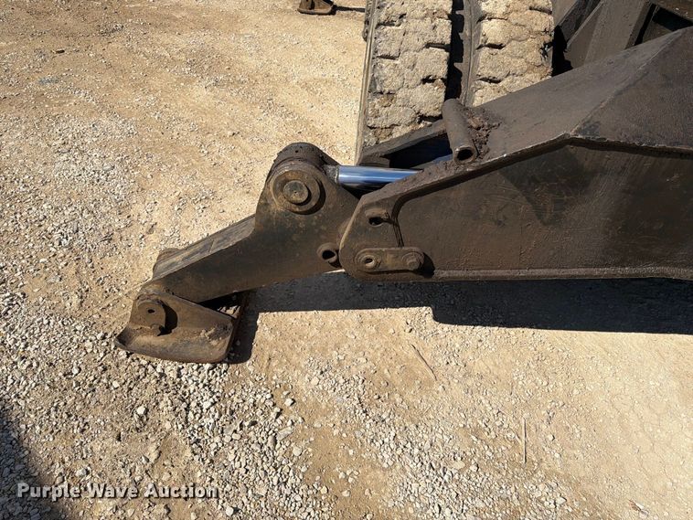 image for item FK3834 1999 Caterpillar M320 wheeled excavator