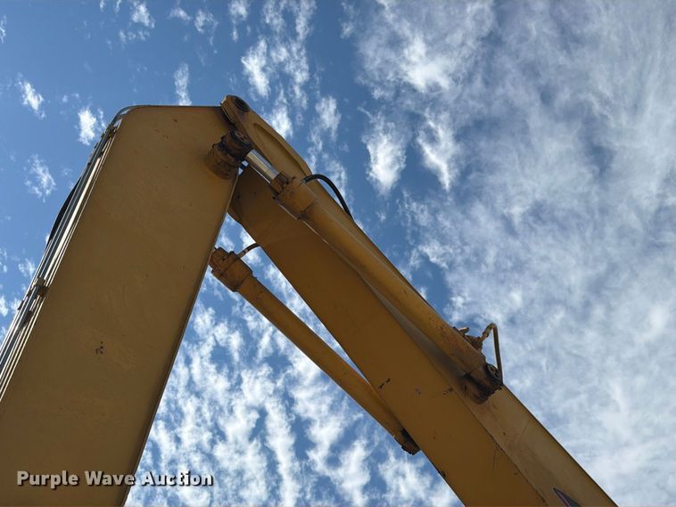 image for item FK3834 1999 Caterpillar M320 wheeled excavator