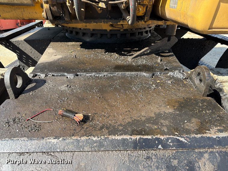 image for item FK3834 1999 Caterpillar M320 wheeled excavator