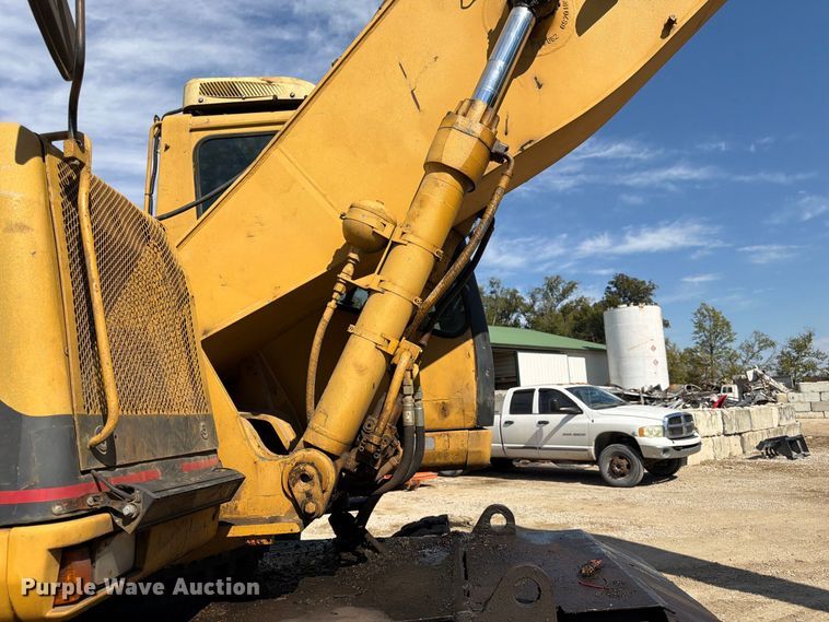 image for item FK3834 1999 Caterpillar M320 wheeled excavator