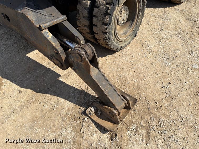 image for item FK3834 1999 Caterpillar M320 wheeled excavator