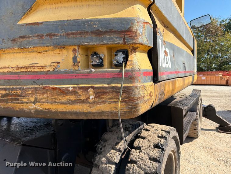 image for item FK3834 1999 Caterpillar M320 wheeled excavator