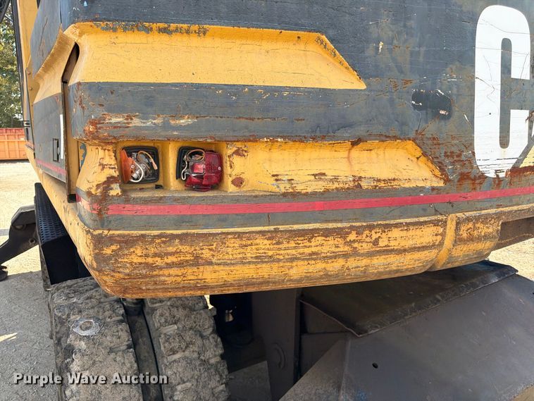 image for item FK3834 1999 Caterpillar M320 wheeled excavator