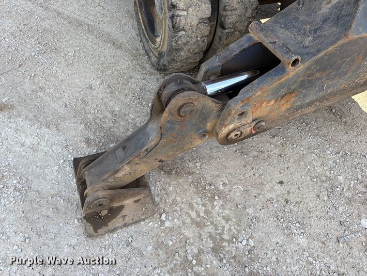 image for item FK3834 1999 Caterpillar M320 wheeled excavator