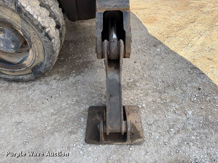 image for item FK3834 1999 Caterpillar M320 wheeled excavator