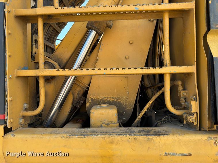 image for item FK3834 1999 Caterpillar M320 wheeled excavator