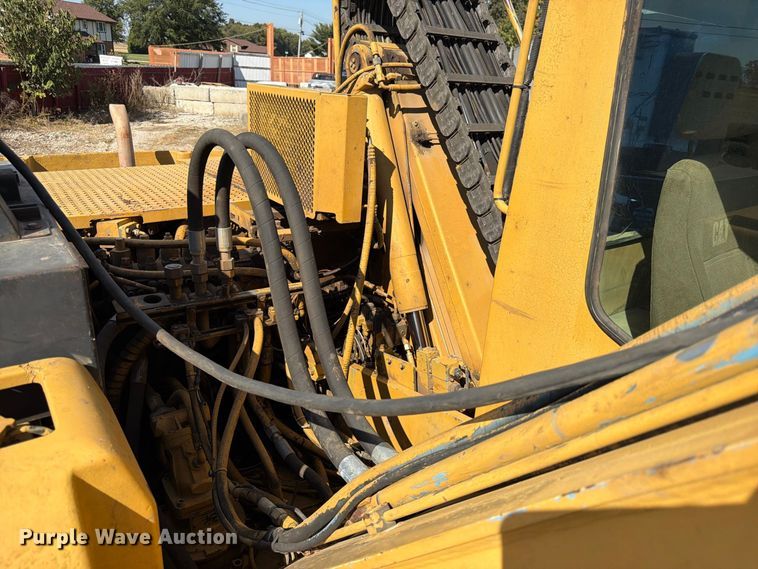 image for item FK3834 1999 Caterpillar M320 wheeled excavator