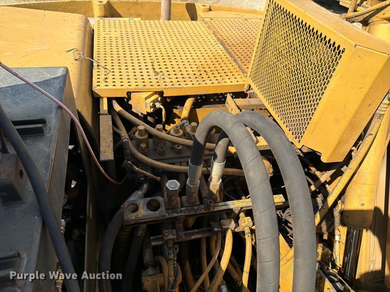 image for item FK3834 1999 Caterpillar M320 wheeled excavator