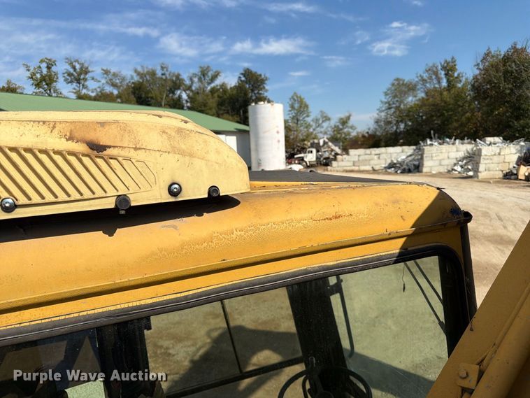image for item FK3834 1999 Caterpillar M320 wheeled excavator