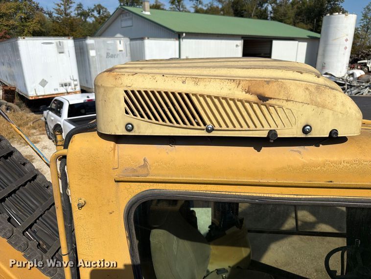 image for item FK3834 1999 Caterpillar M320 wheeled excavator