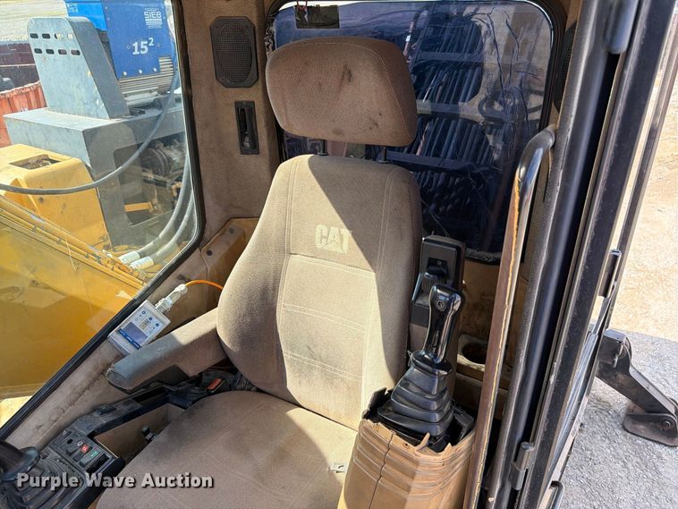 image for item FK3834 1999 Caterpillar M320 wheeled excavator