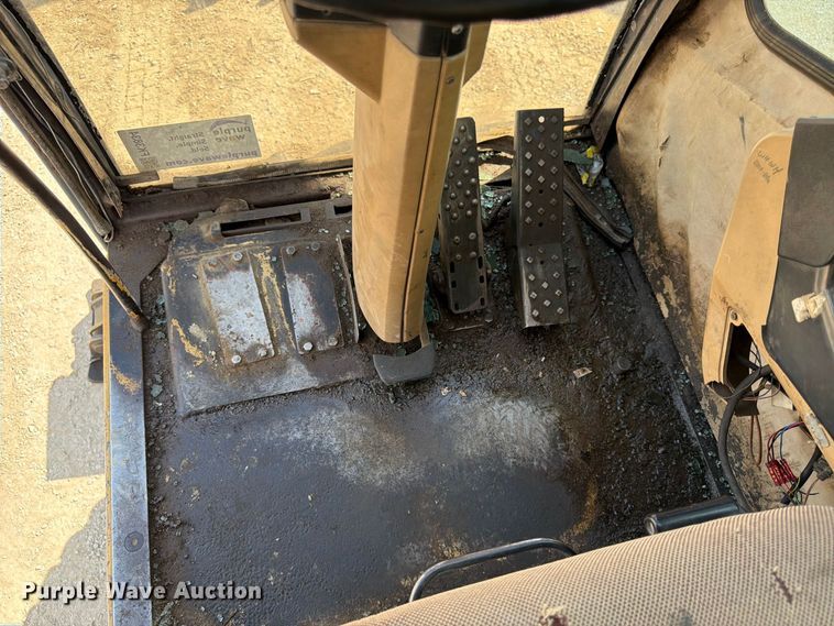 image for item FK3834 1999 Caterpillar M320 wheeled excavator