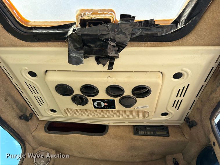 image for item FK3834 1999 Caterpillar M320 wheeled excavator