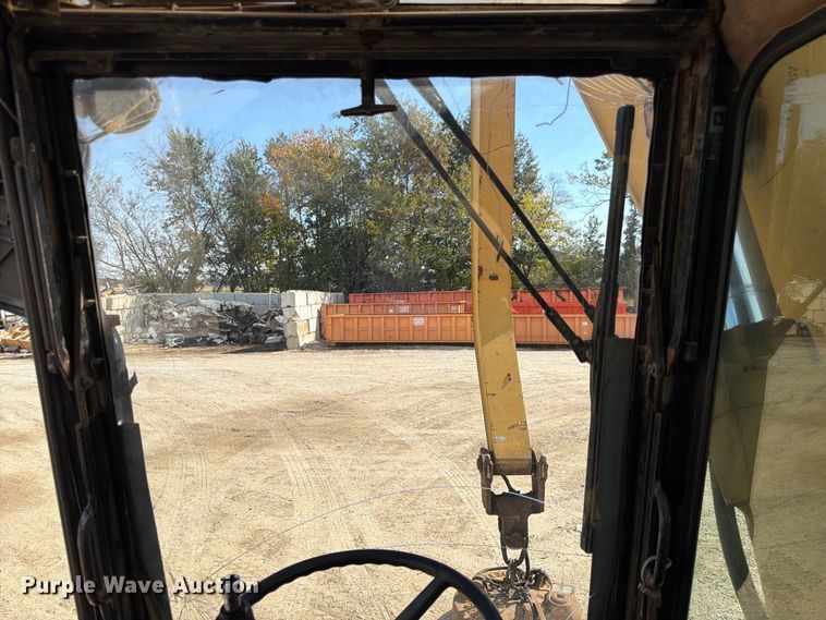 image for item FK3834 1999 Caterpillar M320 wheeled excavator
