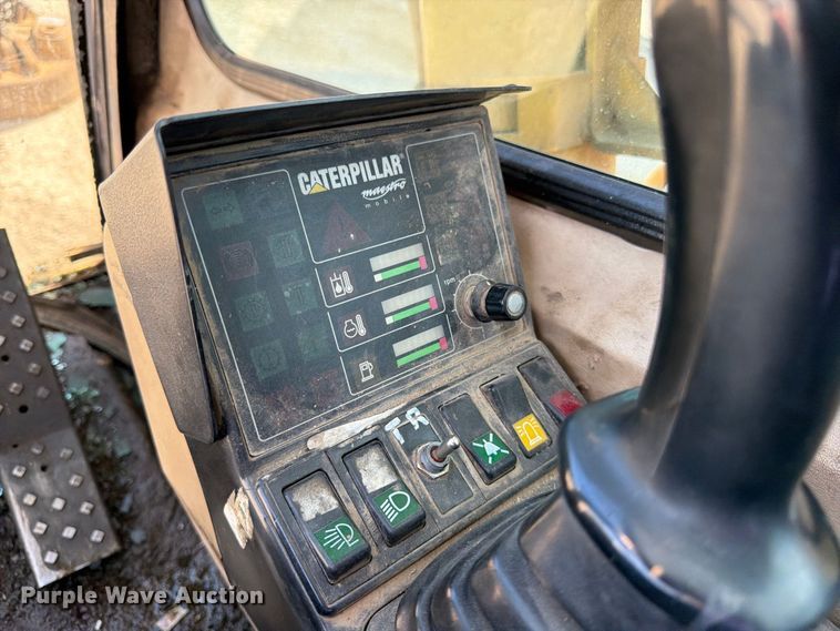 image for item FK3834 1999 Caterpillar M320 wheeled excavator