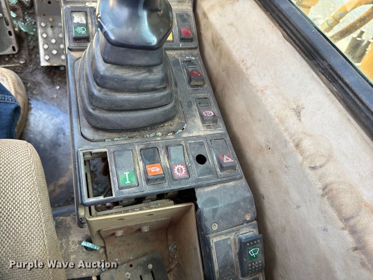 image for item FK3834 1999 Caterpillar M320 wheeled excavator