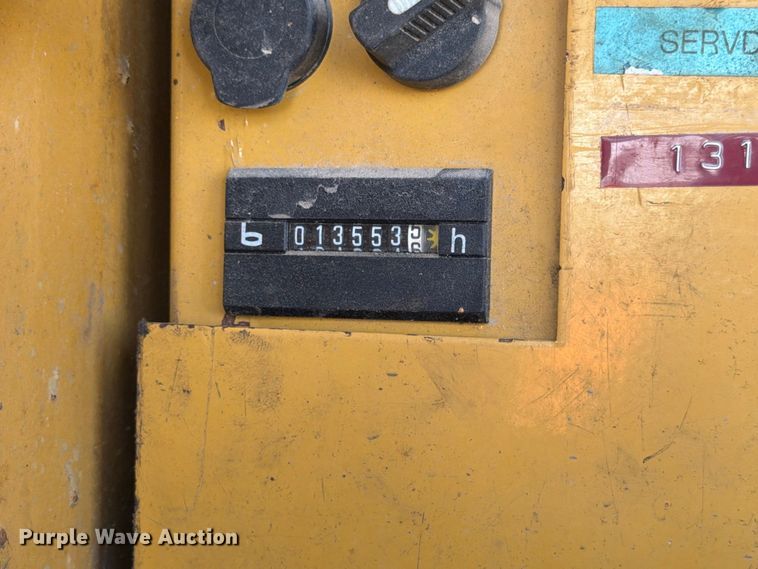 image for item FK3834 1999 Caterpillar M320 wheeled excavator
