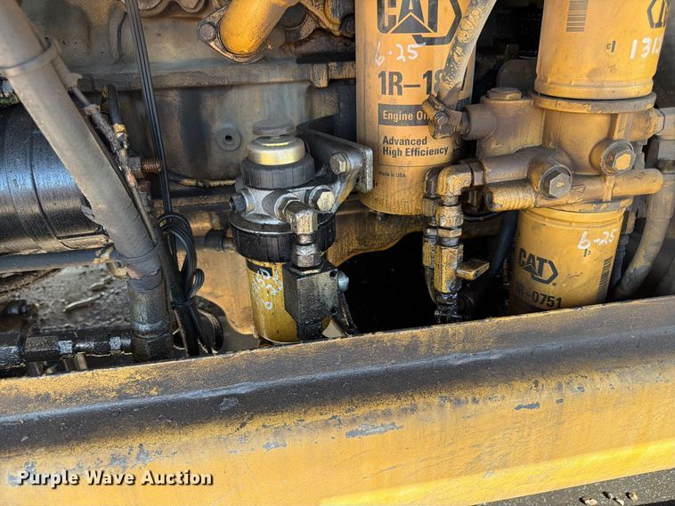 image for item FK3834 1999 Caterpillar M320 wheeled excavator