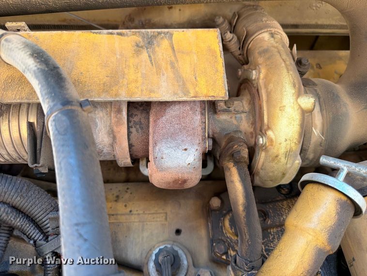image for item FK3834 1999 Caterpillar M320 wheeled excavator