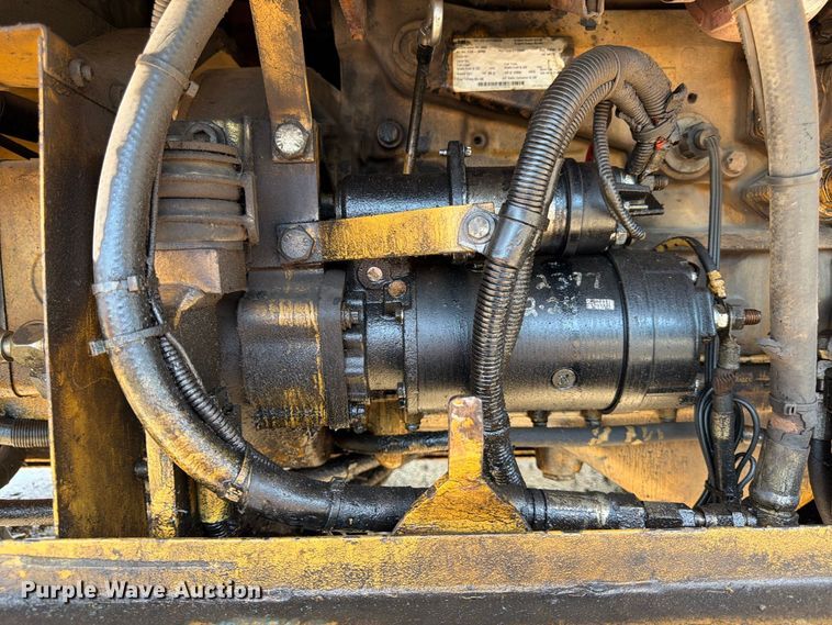 image for item FK3834 1999 Caterpillar M320 wheeled excavator