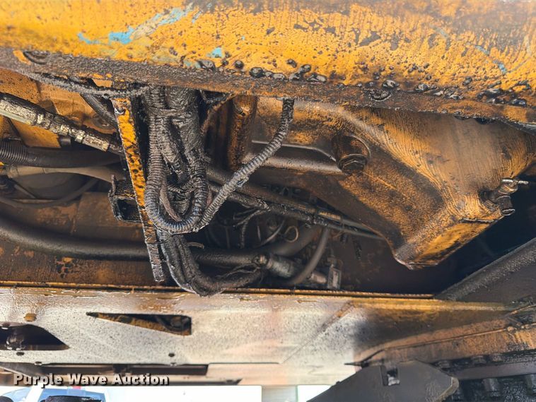 image for item FK3834 1999 Caterpillar M320 wheeled excavator