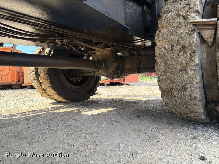 image for item FK3834 1999 Caterpillar M320 wheeled excavator