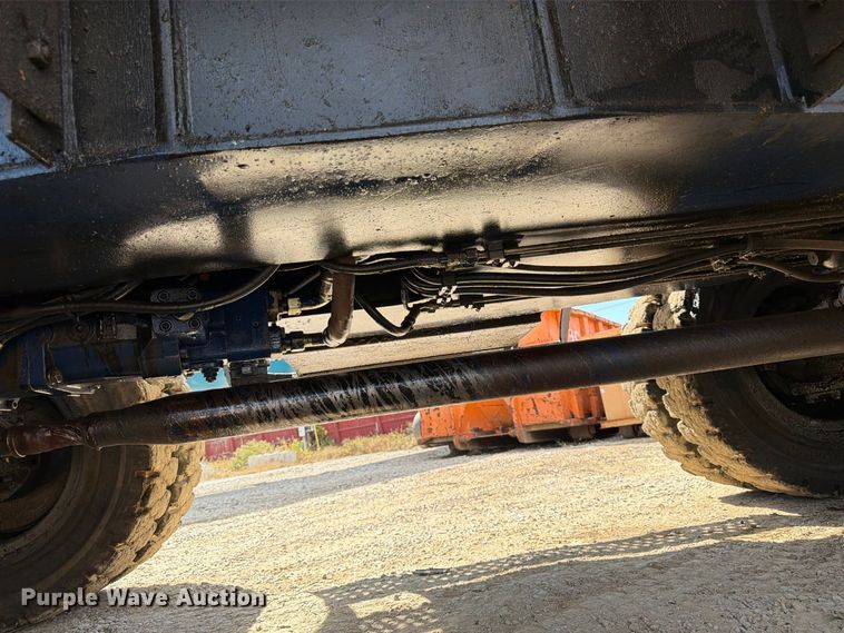 image for item FK3834 1999 Caterpillar M320 wheeled excavator