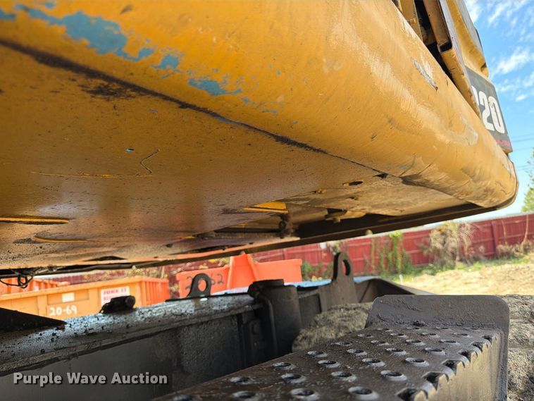 image for item FK3834 1999 Caterpillar M320 wheeled excavator