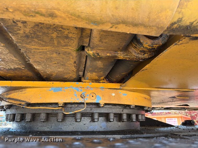 image for item FK3834 1999 Caterpillar M320 wheeled excavator