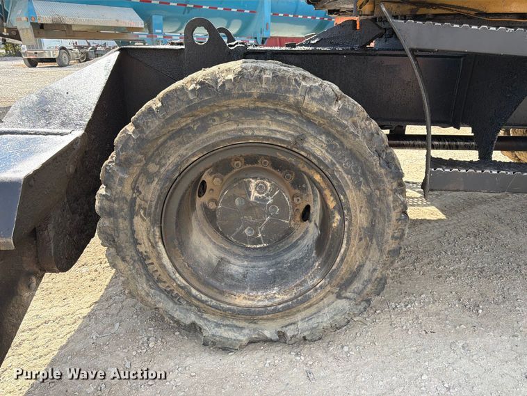 image for item FK3834 1999 Caterpillar M320 wheeled excavator