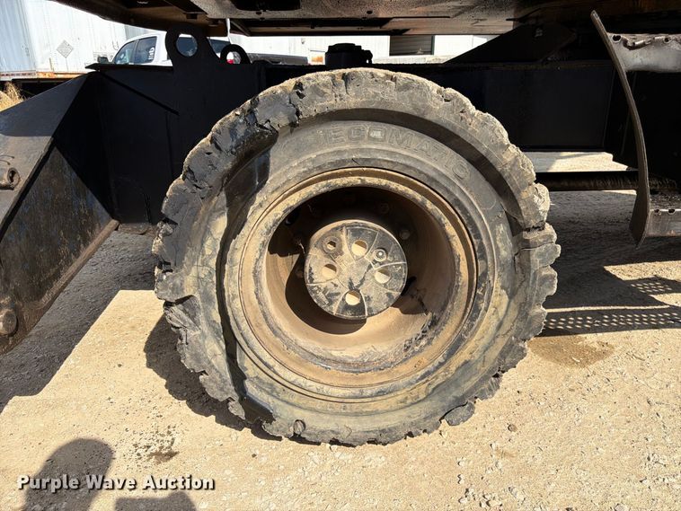 image for item FK3834 1999 Caterpillar M320 wheeled excavator