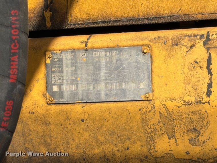 image for item FK3834 1999 Caterpillar M320 wheeled excavator