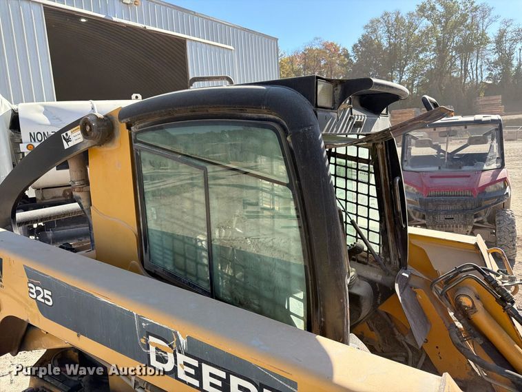 image for item FK3858 2009 John Deere 325 skid steer loader