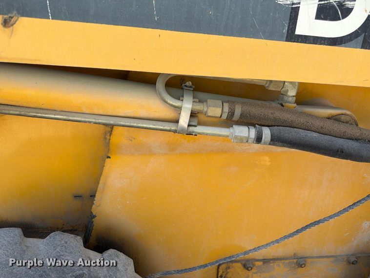 image for item FK3858 2009 John Deere 325 skid steer loader