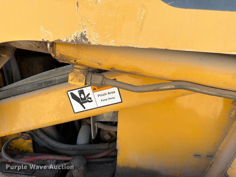 image for item FK3858 2009 John Deere 325 skid steer loader
