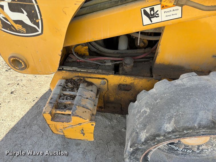 image for item FK3858 2009 John Deere 325 skid steer loader