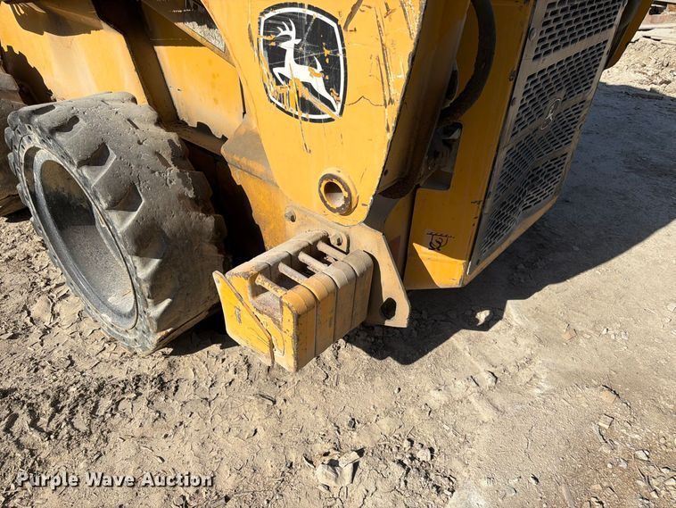 image for item FK3858 2009 John Deere 325 skid steer loader
