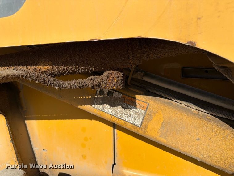 image for item FK3858 2009 John Deere 325 skid steer loader